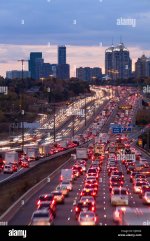 traffic-congestion-along-the-kings-highway-401-at-sunset-in-toronto-KJ630A.jpg
