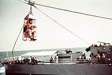 220px-Personnel_transfer_between_USS_Rankin_(AKA-103)_and_USS_Howard_D._Crow_(DE-252),_in_1960.jpg